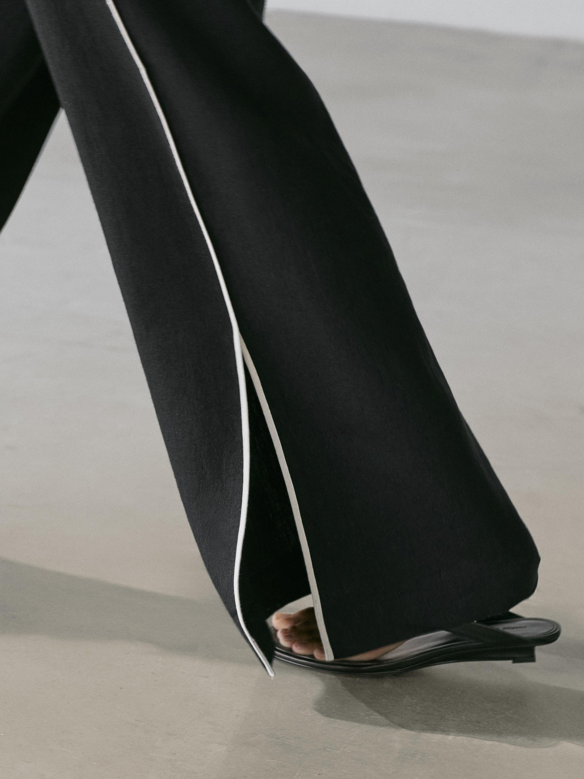 Linen trousers with contrast trim